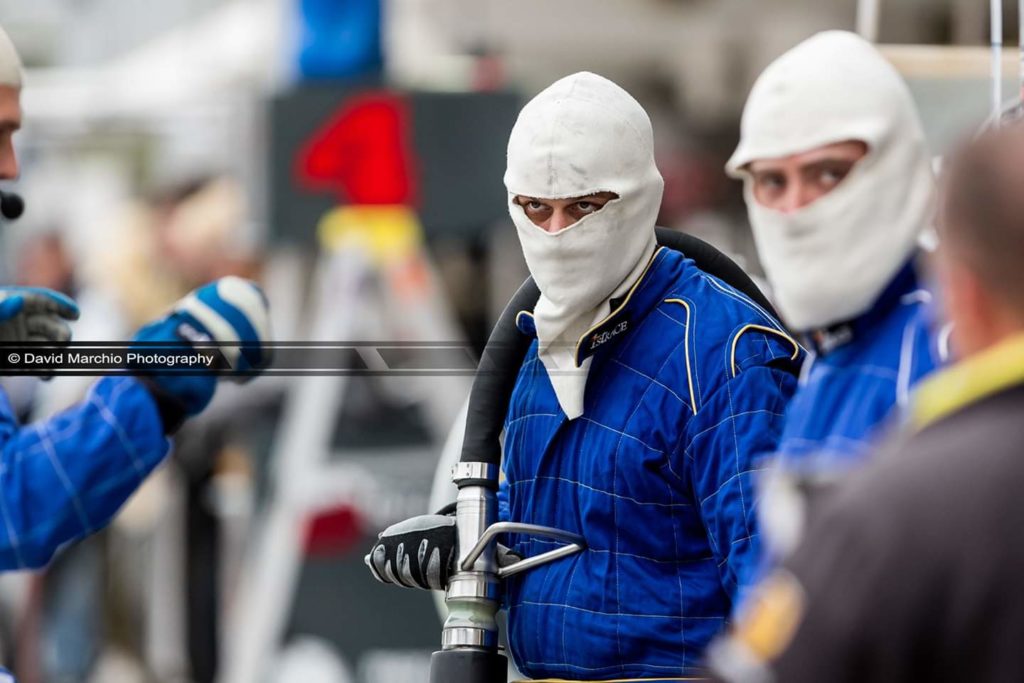 The eyes - The fact that the fire restardent balaclava covers this crew members face, leaving only his eyes visible give it so much impact, and makes the intense look of concentration very prominent, the narrow depth of field almost guiding your own eyes directly to his own.