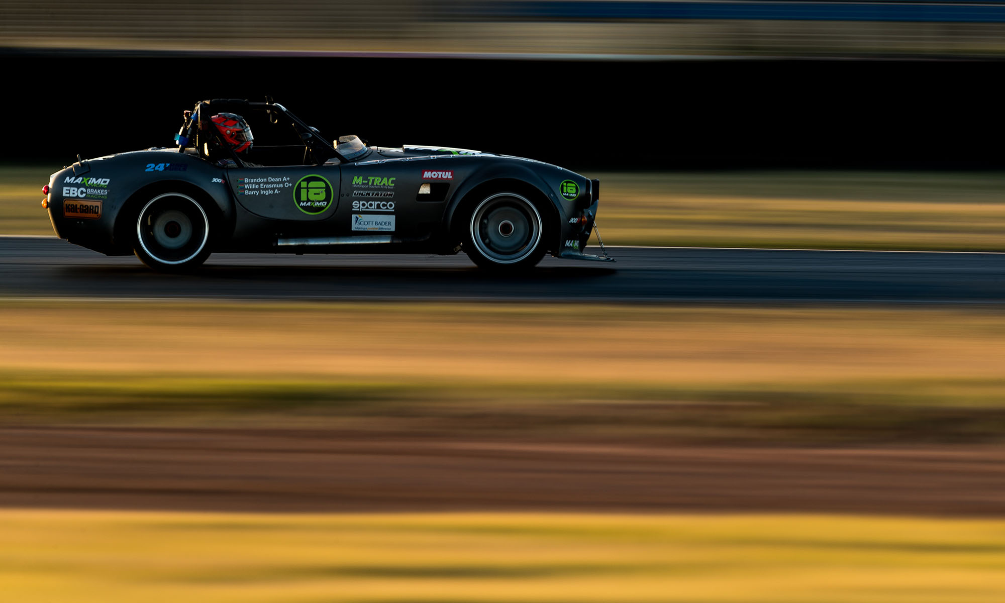 Maximo Racing's Brackdraft roadster at dusk, the team finished 8th overall.