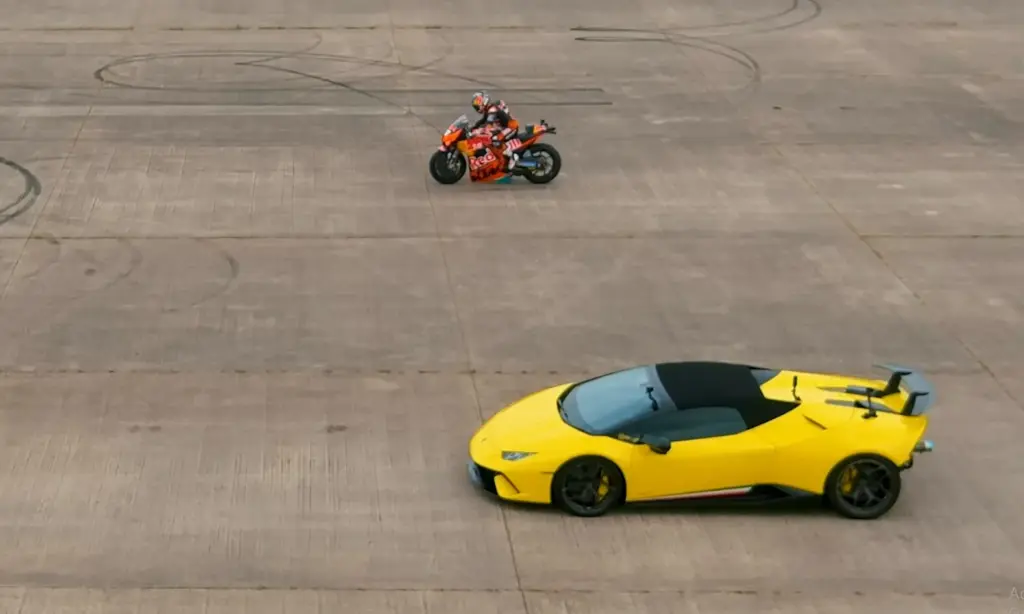 Twin-turbo Lambo Vs MotoGP Bike Drag Race [video]