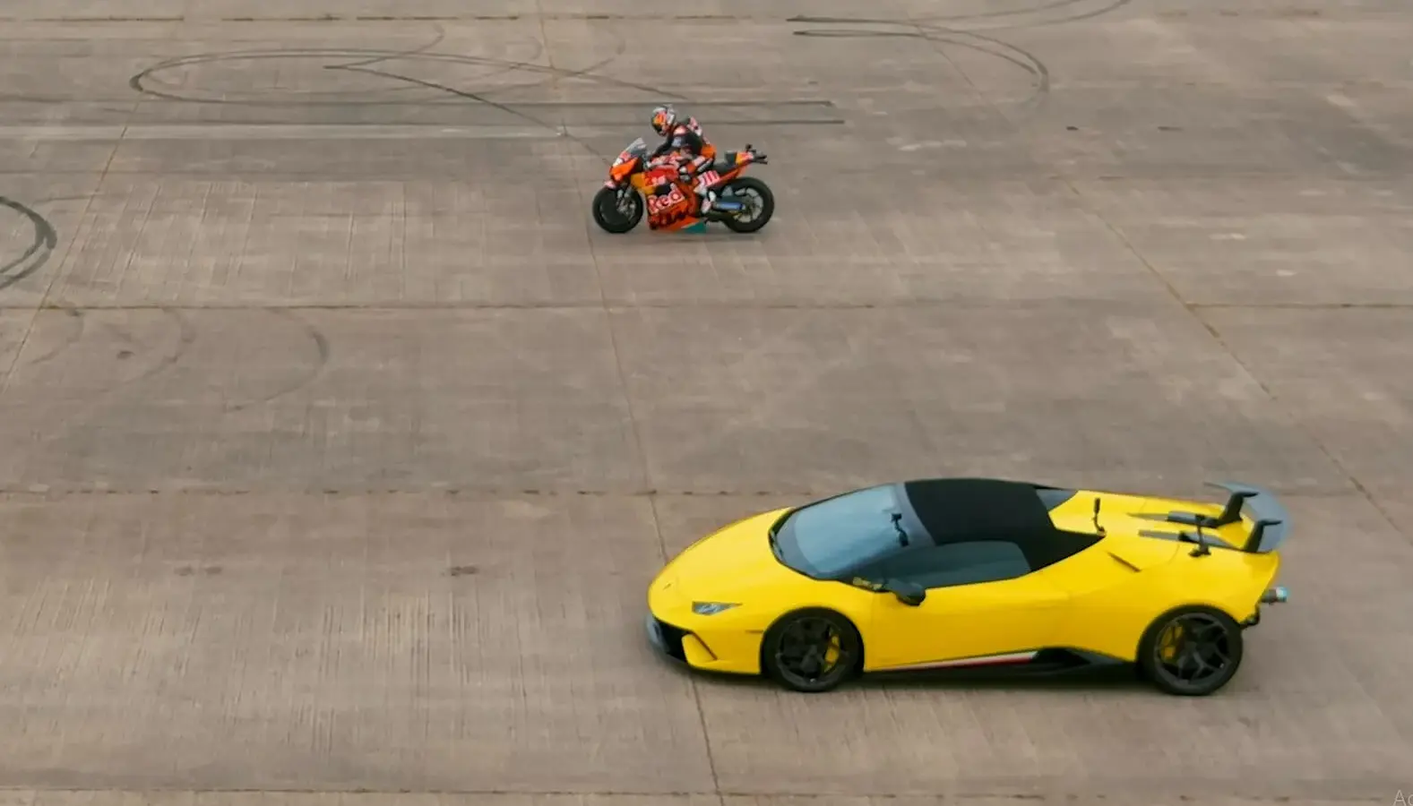 Twin-turbo Lambo Vs MotoGP Bike Drag Race [video]