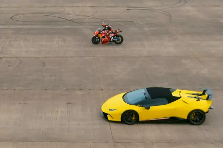 Twin-turbo Lambo Vs MotoGP Bike Drag Race [video]