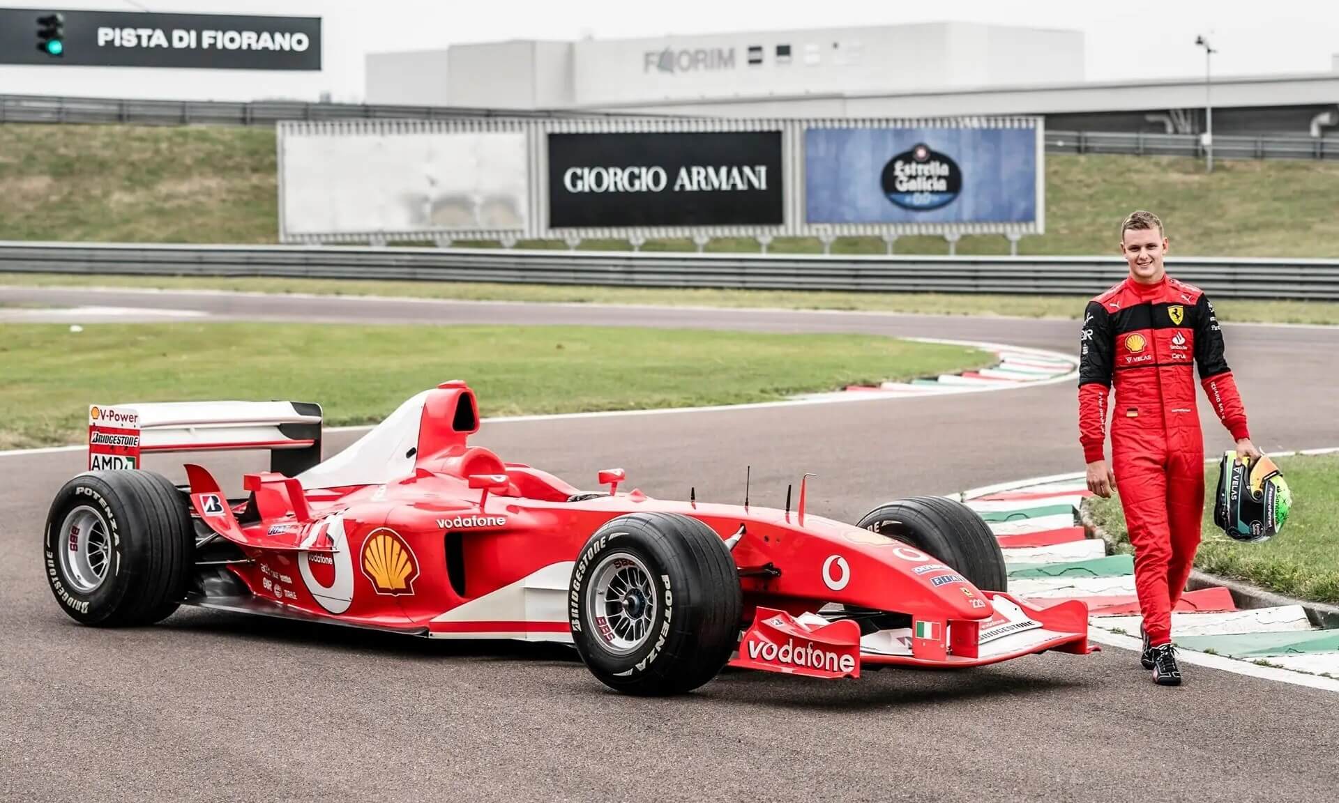 Michael Schumacher Ferrari F2003-GA with Mick Schumacher (2)