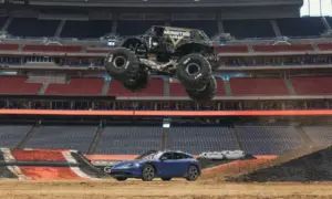 Porsche Taycan Cross Turismo Vs Monster Truck [video]