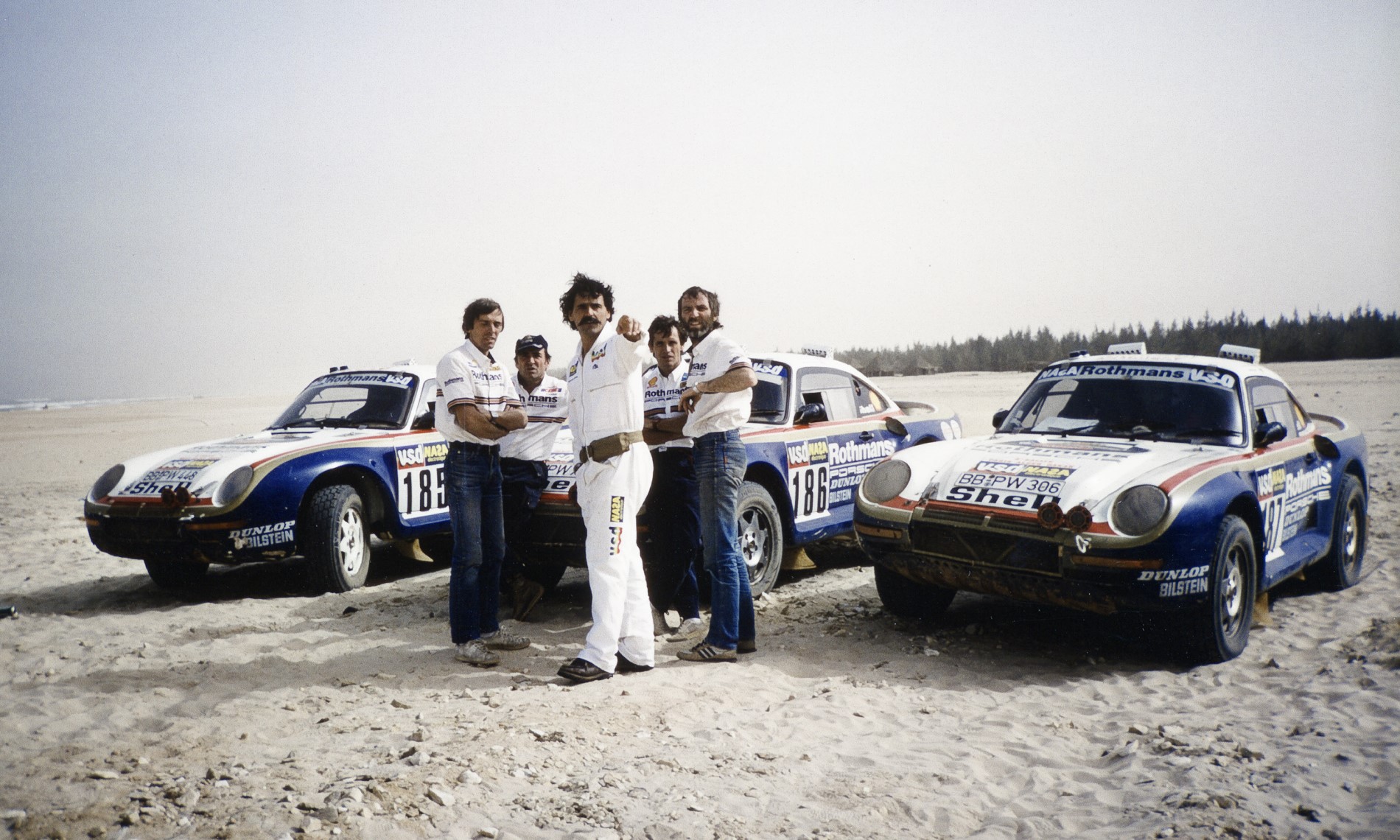 A trio of Porsche 959 Dakar racers on the event in 1986