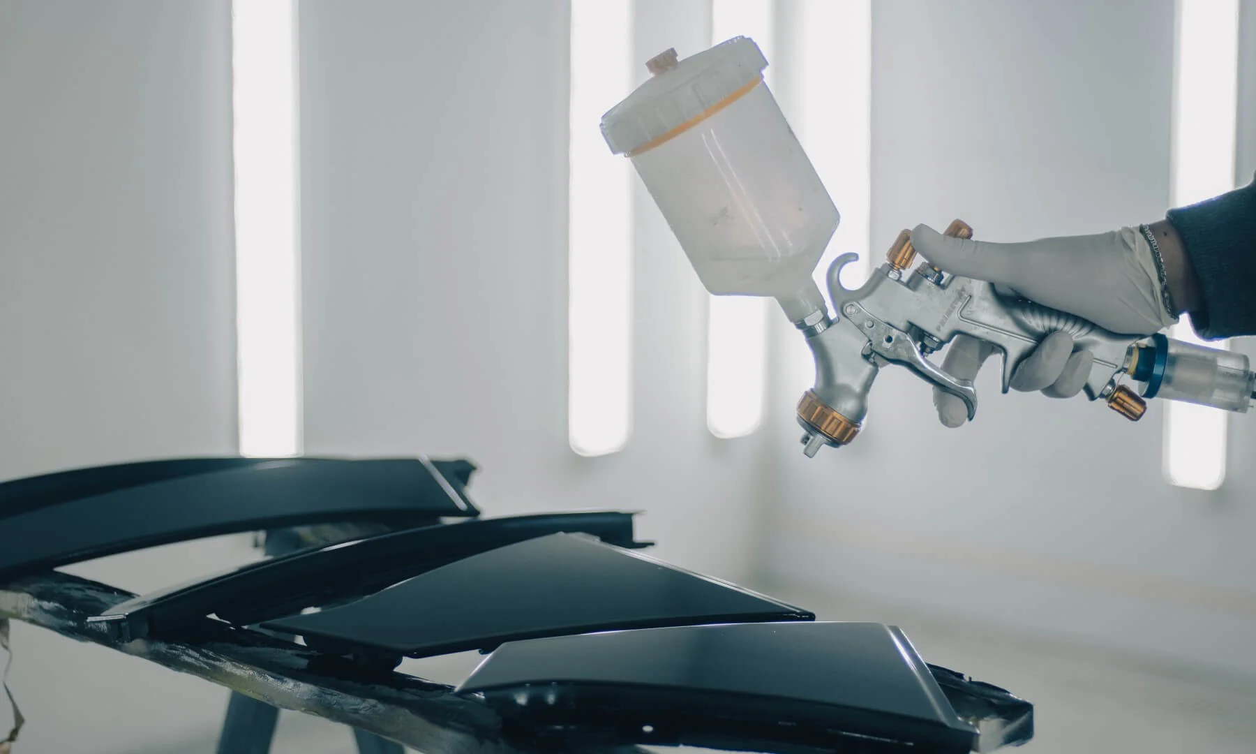 Spray Guns for Automotive Painting (Esmihel Muhammad)