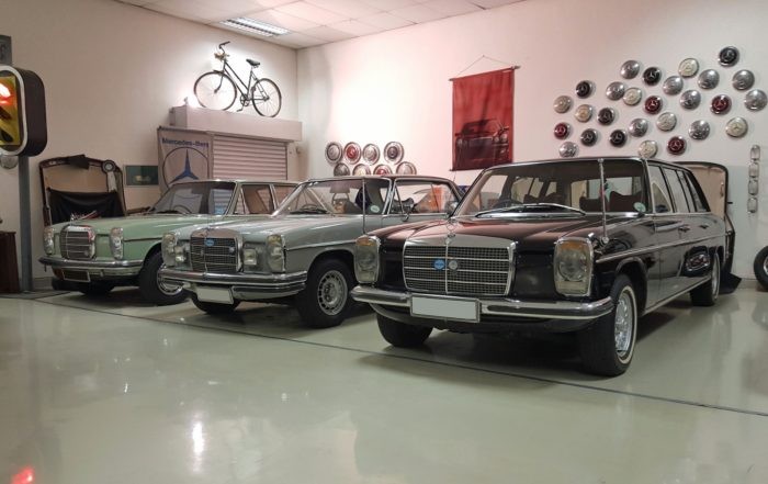 A trio of W114/5 models in long-wheelbase, coupe and sedan body styles