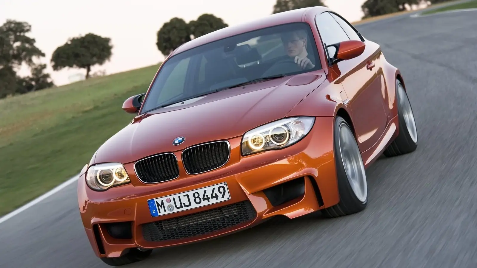 Audi RS3 Sportback vs BMW 1 Series M Coupe (2012)