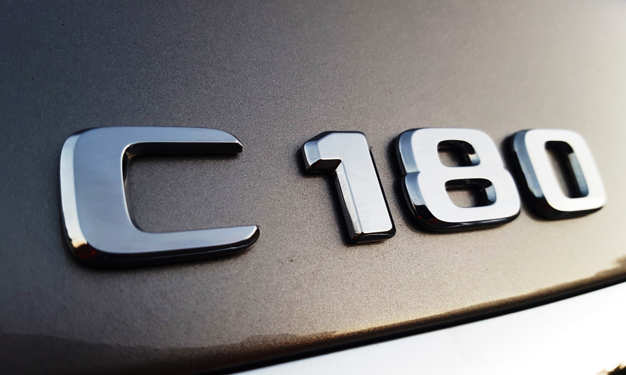 Mercedes-Benz C180 badge