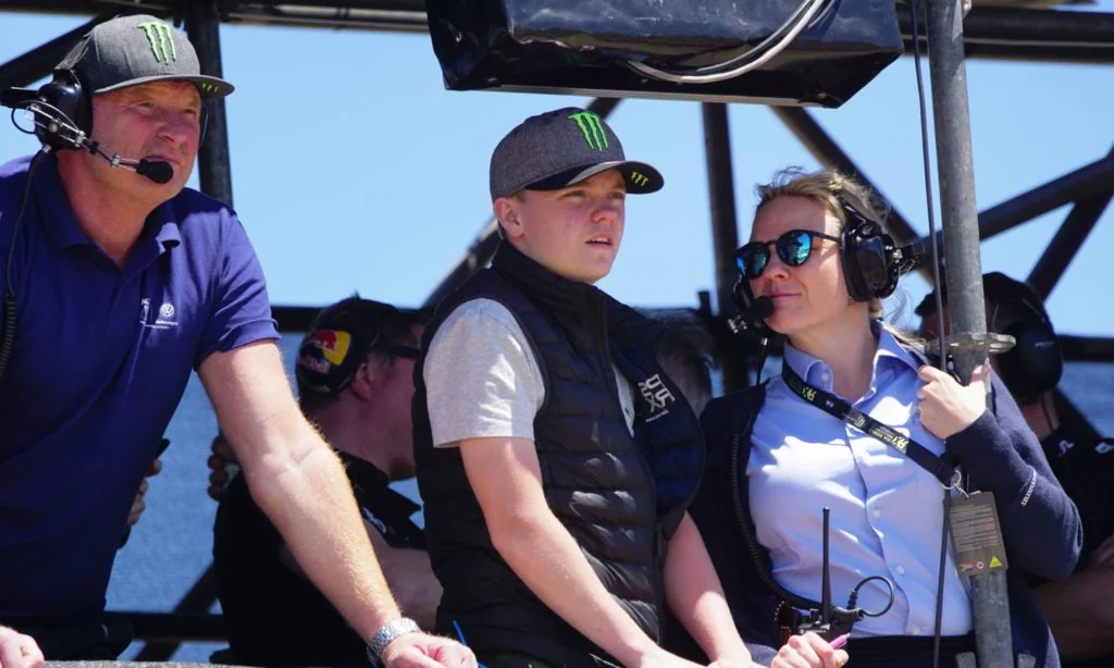 Oliver Solberg (centre) son of Petter eyes out the racing from the spotters’ tower, probably wondering when he will race on the world stage.