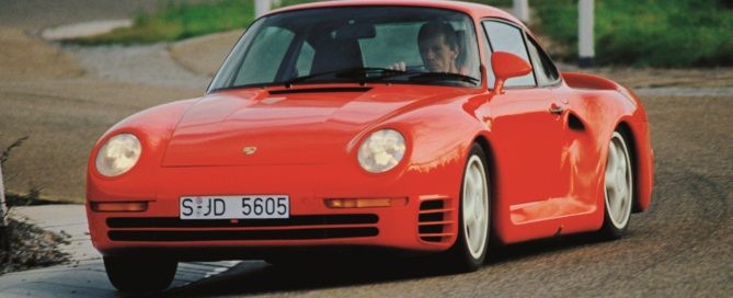 Porsche brand ambassador and test drive Walter Rohrl hustles a 959