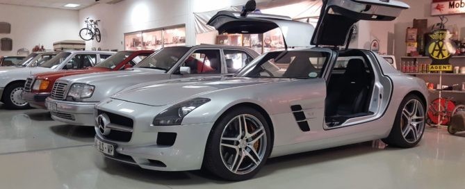 The SLS AMG aka the modern Gullwing in look-at-me 'wings' up pose, is the youngest car in the Mercseum.