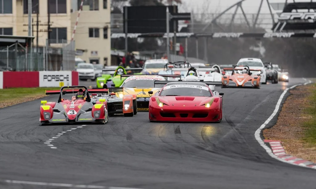 The varied field bunched up at the start of the SA Endurance Serie Campos 600. Leading the charge are a Ligier (left) and Ferrari 458 GT3.